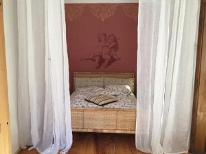 En eller flere senge i et værelse på Schöne Altstadtwohnung im Herzen der Stadt