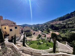 an aerial view of a town with a yard at Casa dello Rio - Elba Affitti in Rio nellʼElba