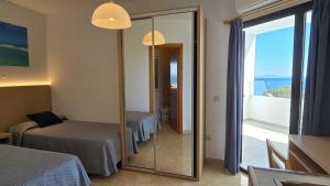 Postel nebo postele na pokoji v ubytování Marina Palmanova Apartamentos
