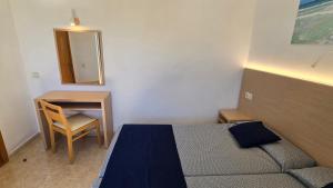Postel nebo postele na pokoji v ubytování Marina Palmanova Apartamentos