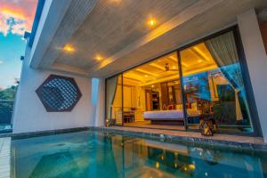 Foto dalla galleria di Baba Beach Club Natai Luxury Pool Villa Hotel by Sri panwa - SHA Plus a Natai Beach