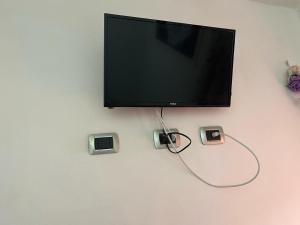 TV a/nebo společenská místnost v ubytování Cà Mea + 1 fotografie