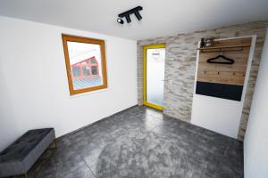 TV a/nebo společenská místnost v ubytování Riedwohnung 1- Lustenau