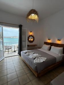 Posteľ alebo postele v izbe v ubytovaní Hotel Livadia