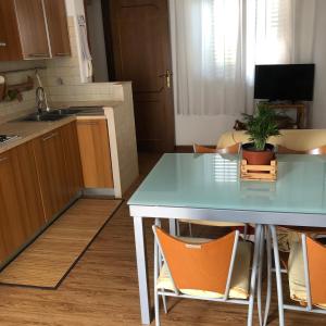 Kuchyň nebo kuchyňský kout v ubytování Casa Dorina charme e comfort a 100 m dal mare