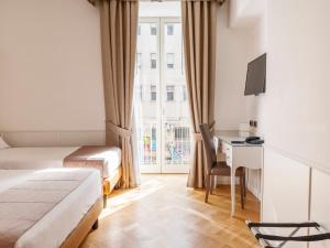 Ένα ή περισσότερα κρεβάτια σε δωμάτιο στο Grand Hotel Europa & Restaurant +86 φωτογραφίες
