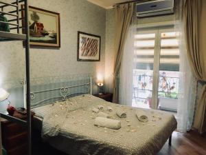 Postel nebo postele na pokoji v ubytování A casa di Simone