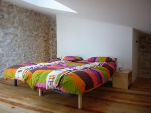 Ένα ή περισσότερα κρεβάτια σε δωμάτιο στο Maison T2 village Gorges Ardèche