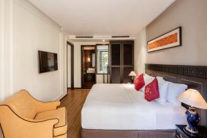 Postel nebo postele na pokoji v ubytování Hotel Sapa Square Affiliated by Melia + 37 fotografií