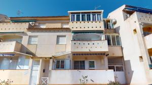 a building with balconies on the side of it at Holidoo Travel Casa Dorada in Los Alcázares