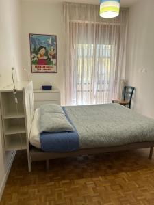 Postel nebo postele na pokoji v ubytování Marie Home Florence