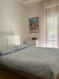 Postel nebo postele na pokoji v ubytování Marie Home Florence