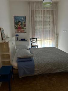 Postel nebo postele na pokoji v ubytování Marie Home Florence