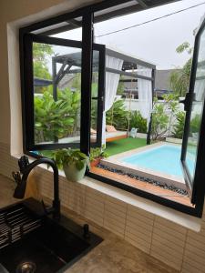 Πισίνα στο ή κοντά στο Dahlia Kulim Pool Homestay