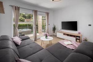 TV/trung tâm giải trí tại Villa Anelli