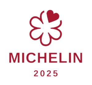 a logo for the michigan hockey team at Bella Vista Hôtel, Suites & Maisons in Porticcio