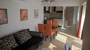 A kitchen or kitchenette at Gereben Apartman Pécs