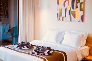 TheHub Pererenan Coworking, Pool and Rooftop客房内的一张或多张床位