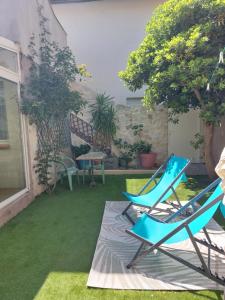Κήπος έξω από το Sète centre - maison de vacances - 2 chambres - 4 personnes - 60 m2 avec parking gratuit privé, wifi et clim +6 φωτογραφίες