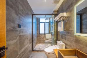 Koupelna v ubytování Yichun Jiuyu Xinzhi Light Luxury B&B