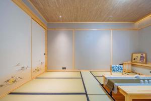 Fotografie z fotogalerie ubytování Yichun Jiuyu Xinzhi Light Luxury B&B v destinaci Yichun