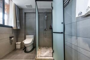 Koupelna v ubytování Yichun Jiuyu Xinzhi Light Luxury B&B