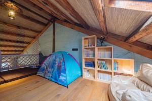 Postel nebo postele na pokoji v ubytování Yichun Jiuyu Xinzhi Light Luxury B&B
