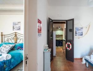 En eller flere senge i et værelse på Vista Sul Blu Private Residence 3