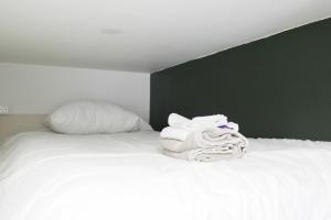 Posteľ alebo postele v izbe v ubytovaní Nice studio near Paris