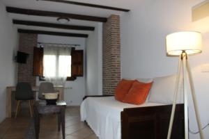 Postel nebo postele na pokoji v ubytování Apartamentos de Astroturismo la Cañada + 33 fotografií