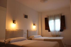 Postel nebo postele na pokoji v ubytování Apartamentos de Astroturismo la Cañada