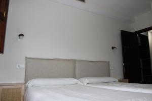 Postel nebo postele na pokoji v ubytování Apartamentos de Astroturismo la Cañada