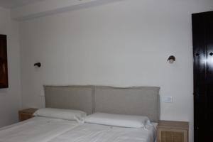 Postel nebo postele na pokoji v ubytování Apartamentos de Astroturismo la Cañada