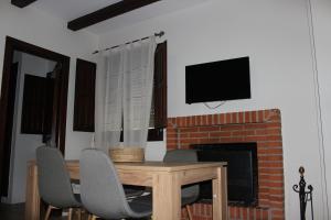 TV a/nebo společenská místnost v ubytování Apartamentos de Astroturismo la Cañada