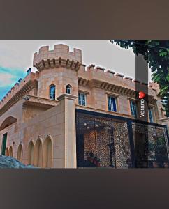 a building with a tower on top of it at Vorano Boutique Hotel Islamabad in Islamabad