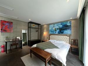 Letto o letti in una camera di Suzhou Unique Space Design Art Hotel