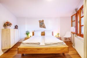 Postel nebo postele na pokoji v ubytování Apartments No.59 Loket