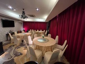 TV a/nebo společenská místnost v ubytování Hotel De Leon