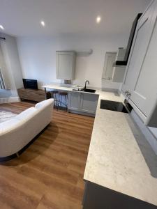 Køkken eller tekøkken på Westbourne Alum Chine Loft apartment