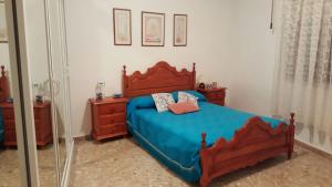 מיטה או מיטות בחדר ב-Casa Trini