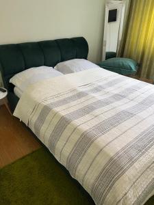 Postel nebo postele na pokoji v ubytování Cottage u Romana