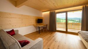 TV a/nebo společenská místnost v ubytování Pircherhof - Adults Only am Biobauernhof