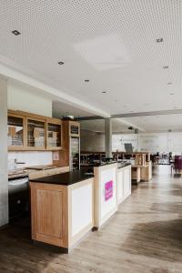 Kuchyň nebo kuchyňský kout v ubytování MEYERHOF - Bioweingut, Vinothek & Gästehaus + 26 fotografií