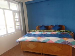 A bed or beds in a room at Check-in & Chill