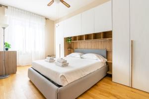 Postel nebo postele na pokoji v ubytování Toselli Apartment With Terrace