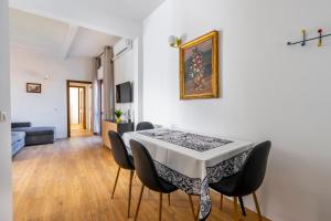 Posezení v ubytování Toselli Apartment With Terrace