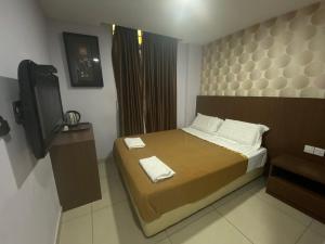 Postel nebo postele na pokoji v ubytování Hotel O Hotel Hamilas