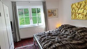 Ein Bett oder Betten in einem Zimmer der Unterkunft Exklusive Ferienwohnungen und Business Apartments Marburg