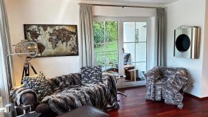Ein Sitzbereich in der Unterkunft Exklusive Ferienwohnungen und Business Apartments Marburg