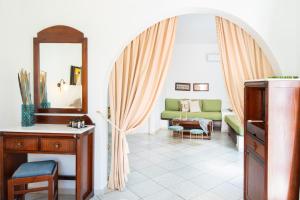 Et opholdsområde på Sunrock Suites - Villa Petunia